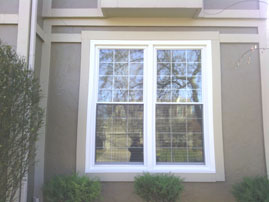 Coronet Window Company PRIMO collection double hung with colonial grids.